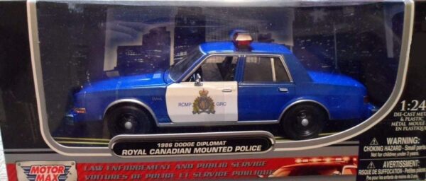 76484 - 1986 DODGE DIPLOMATE CANADIAN RCMP POLICE CAR (BLUE AND WHITE)