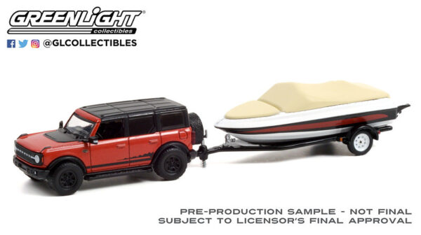 32230d - 2021 Ford Bronco Wildtrak in Rapid Red Metallic with Boat Trailer