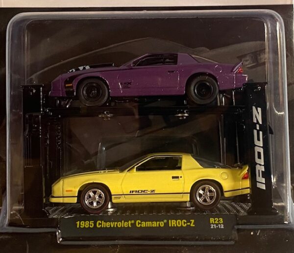 33000 23c1 - 1985 Chevrolet Camaro IROC-Z in Royal Plum Metallic and 1985 Chevrolet Camaro IROC-Z in Butternut Yellow with Auto-Lift