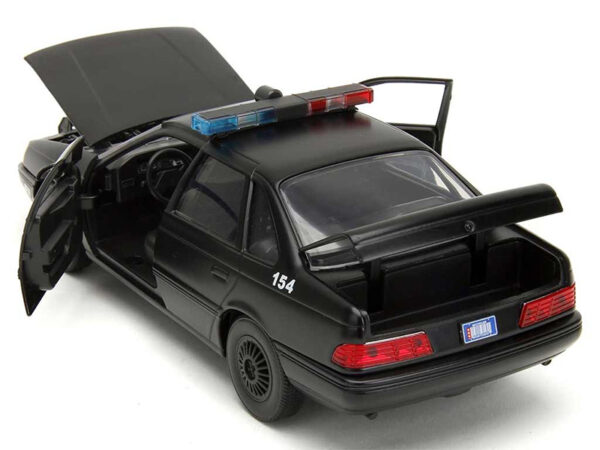 33743b - Police - 1986 Ford Taurus Police Interceptor with Figure - RoboCop (1987) • Hollywood Rides